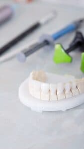 Несъемные зубные протезы